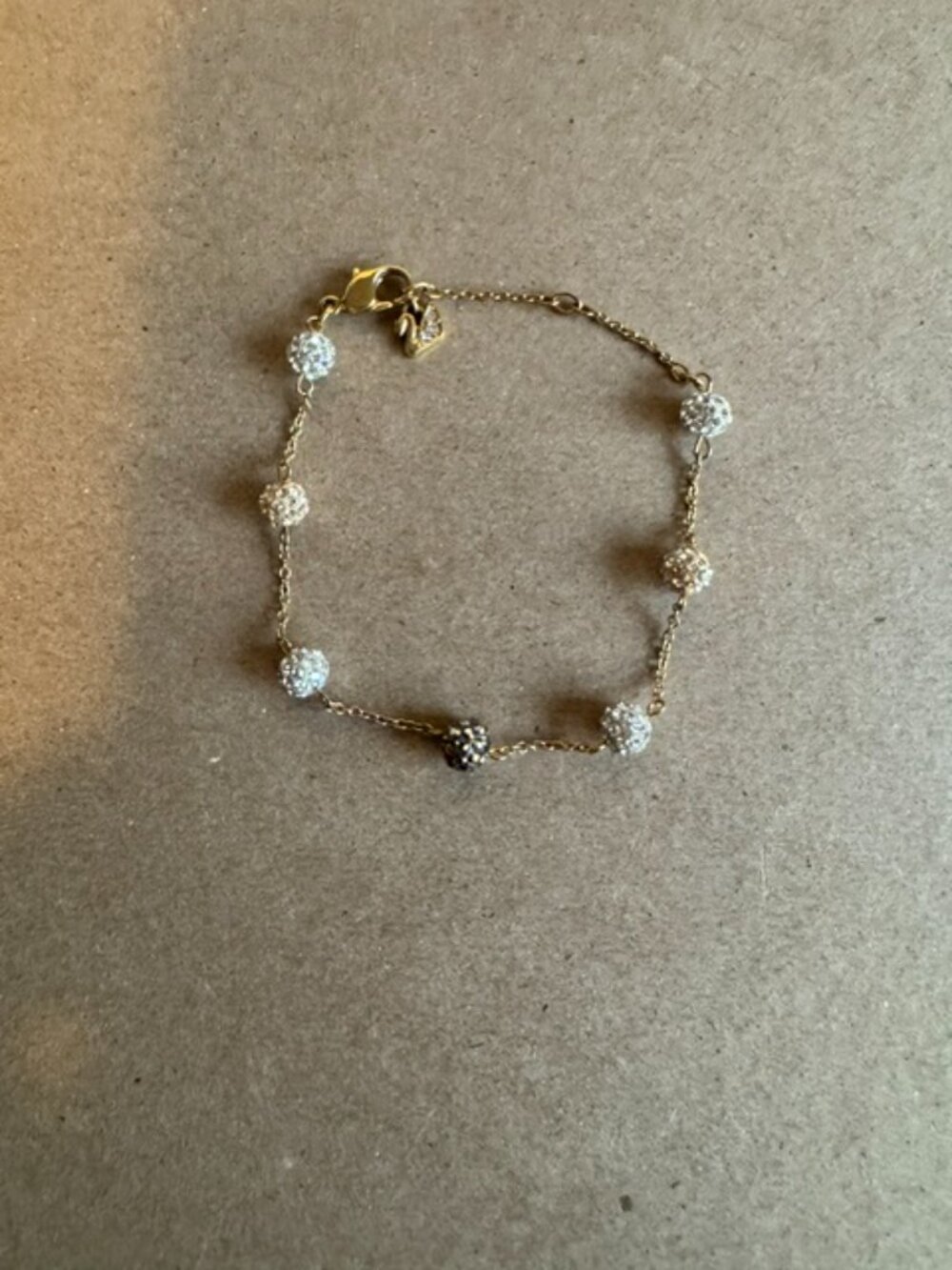 SWAROSKI BLACK & WHITE CRYSTAL BALL STATION BRACELET -  GOLD TONE